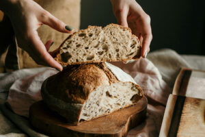 Whole wheat bread is darker in color than white bread. Whole wheat is varying shades of brown in color, while white is lighter in color. Whole wheat bread is made from grains that have not been under much processing. White is made from flour that is highly processed and refined.